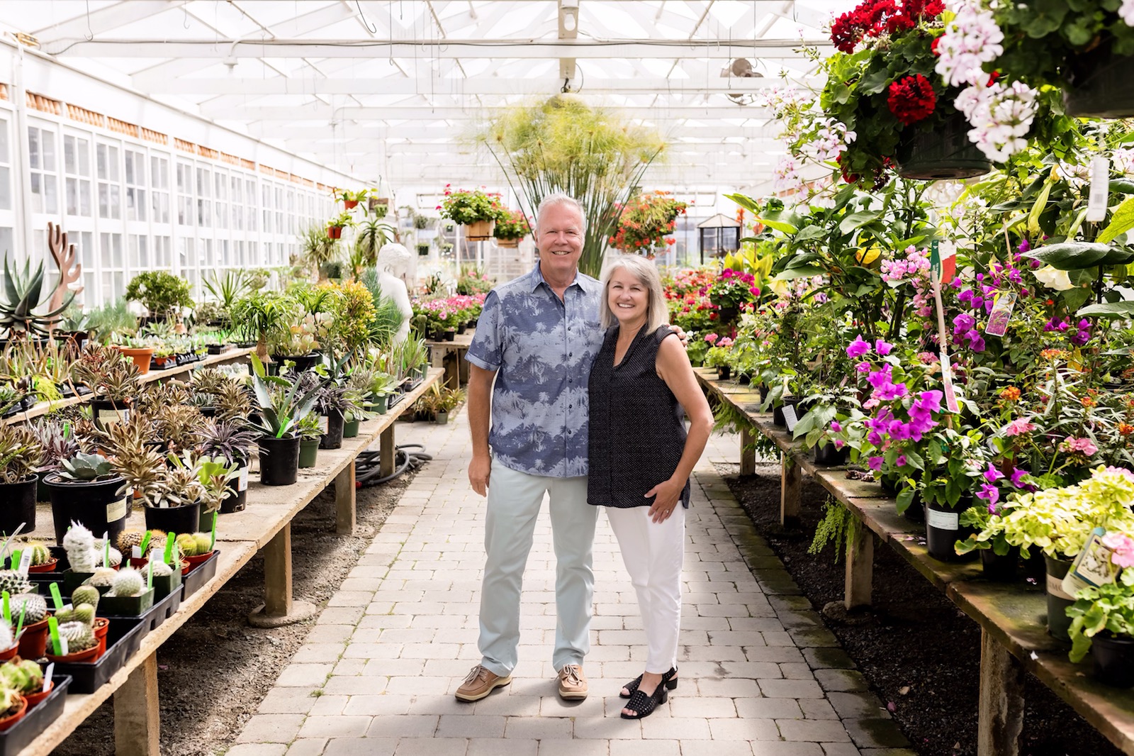 John Devore holding his sports memorabilia